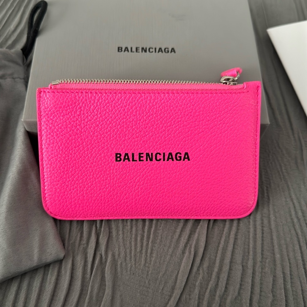 Balenciaga card and coin holder in pink with black writing